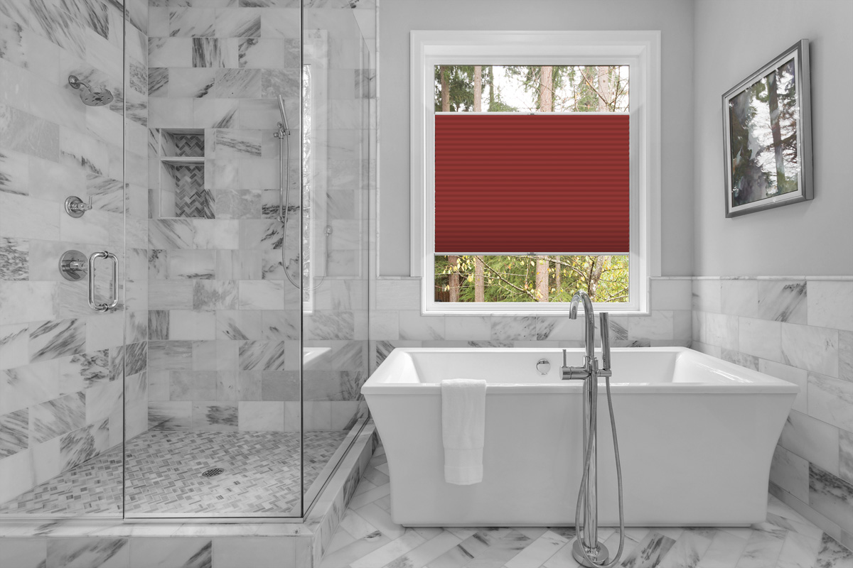 Bathroom with bathtub and shower in new luxury home with all gla