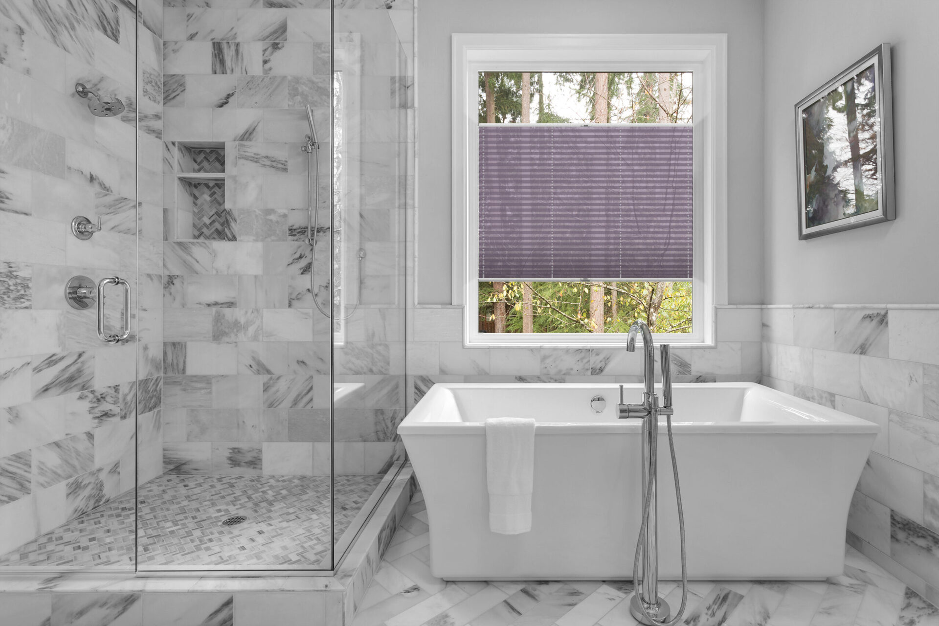 Bathroom with bathtub and shower in new luxury home with all gla